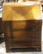 An early 20th century walnut bureau