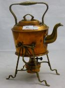 An Arts & Crafts copper kettle on stand,