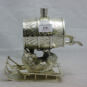 A novelty silver plated bear with spirit barrel