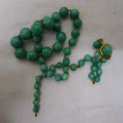 A jade bead necklace