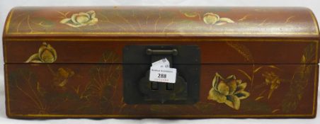 A red lacquered glove box
