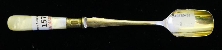 A silver and mother-of-pearl Stilton scoop