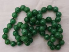 A string of apple green jade beads