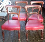 A set of four Victorian mahogany balloon back dining chairs