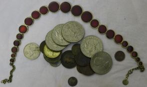 A quantity of coins and a necklace