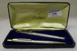 A 1970s sterling silver Parker fountain pen with 14 K nib and an associated sterling silver