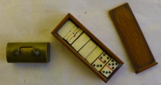 A miniature dominoes set and another