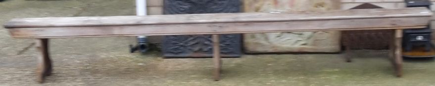 A large 19th century pine bench