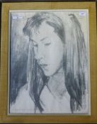 A charcoal portrait of a girl