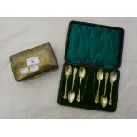 A silver cigarette box and cased silver teaspoons