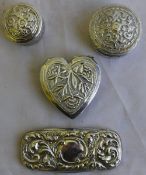 Three Indian silver boxes and a silver lid