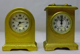 Two miniature clocks