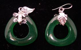A pair of silver and jade earrings