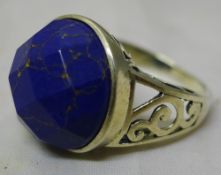 A silver and lapiz ring