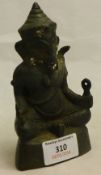 A bronze figure in the form of Ganesh