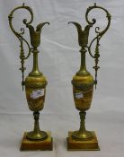 A pair of alabaster mounted ewers