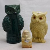 Three owl figurines