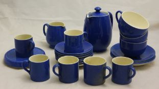 A small quantity of Moorcroft powder blue tea and coffee wares