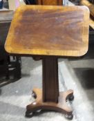 An early 19th century mahogany architects table