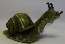 A cold painted bronze model of a snail