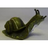 A cold painted bronze model of a snail