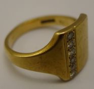 A gentleman's diamond set gold signet ring