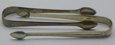 Two pairs of silver tongs