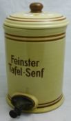 An early 20th century German stoneware table mustard dispenser