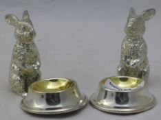 A pair of silver plated rabbit salts