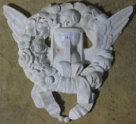 A carved marble plaque