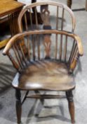 A 19th century yew wood and elm Windsor chair