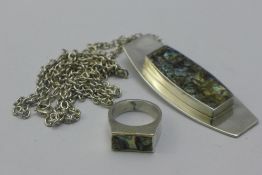 A Danish pendant and ring en-suite