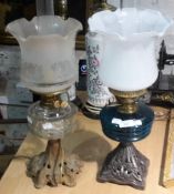 Two oil lamps,