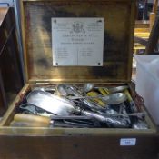 An oak canteen containing plated flatware, etc.