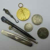 A silver penknife, coins, etc.