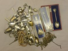 A quantity of silver and plated spoons, jewellery, etc.
