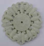 A white jade roundel decorated with bats