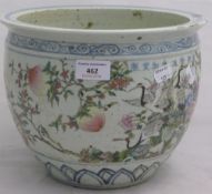 A Chinese porcelain jardiniere decorated with peaches