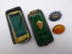 Three pieces of vintage jewellery,