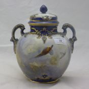 A Royal Worcester vase and cover, decorated with pheasants by James Stinton,
