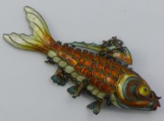 An enamelled decorated fish