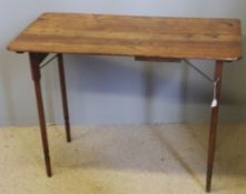 A 19th century French elm folding table,