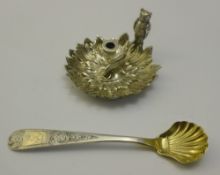 A Victorian miniature silver chamber stick and a salt spoon