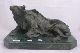 An abstract bronze model of a bull