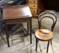 A child's desk and bentwood chair