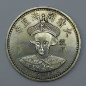 A large Chinese coin