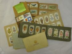 A quantity of cigarette cards,