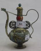 An Oriental white metal mounted teapot