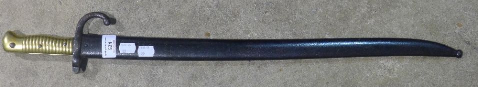 A late 19th/early 20th century brass handled bayonet