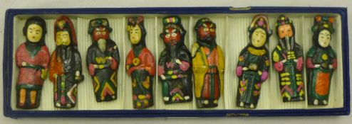 A boxed set of painted Oriental figures